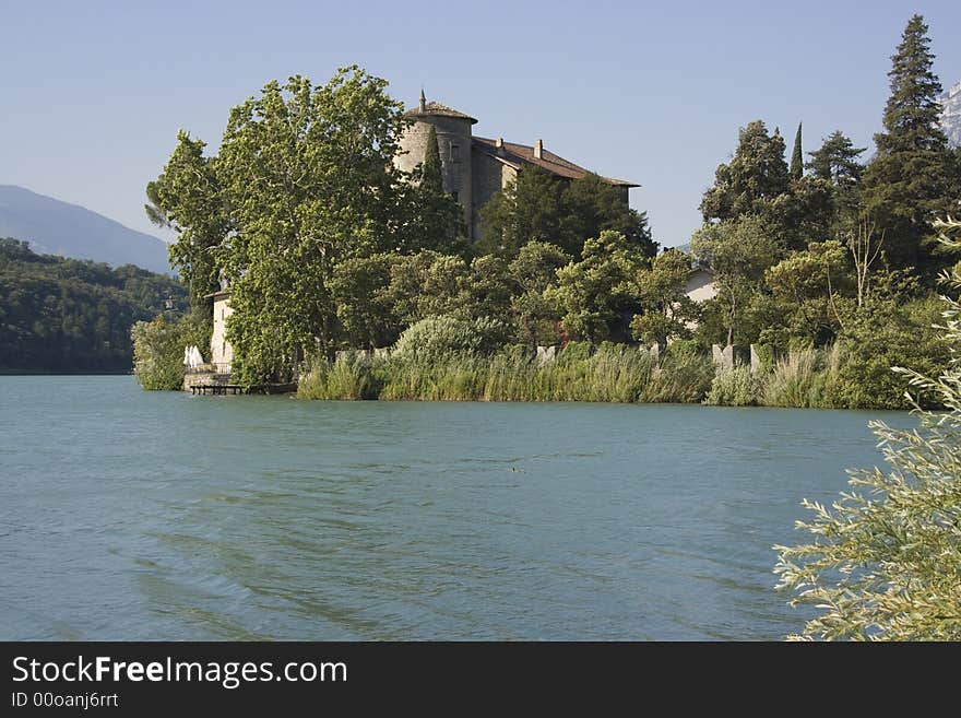 Old castle surrounded by lake