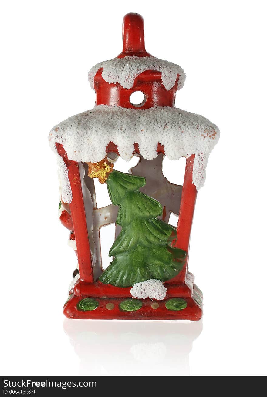 Christmas toy. A toy on a fur-tree with porcelain fir - three