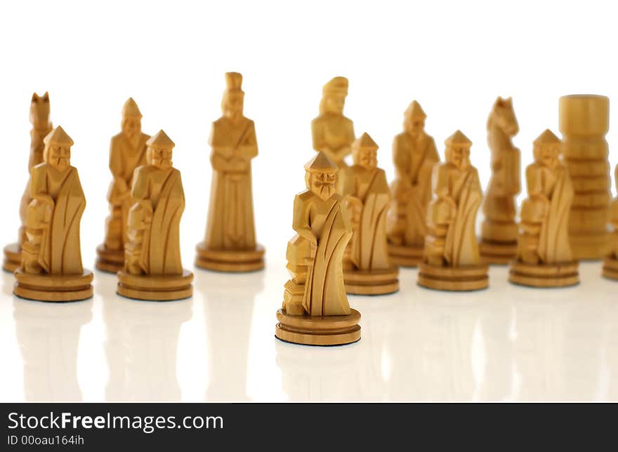 Course a pawn. Chessmen cut out from a tree - handicraft