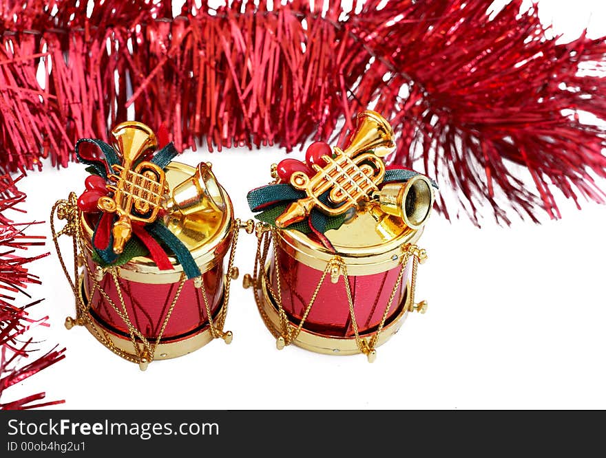 Two Christmas Decorations With Red Tinsel