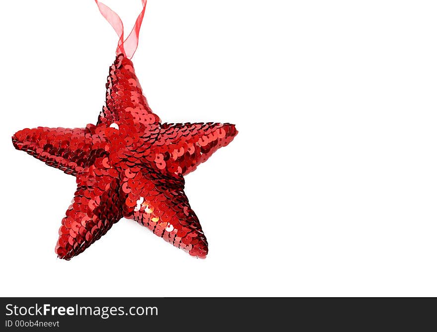 Red shiny Christmas star decoration on white background. Red shiny Christmas star decoration on white background