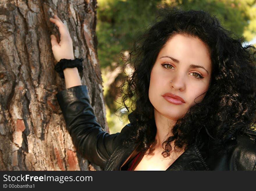 A brunette young beautiful woman with green eyes. A brunette young beautiful woman with green eyes