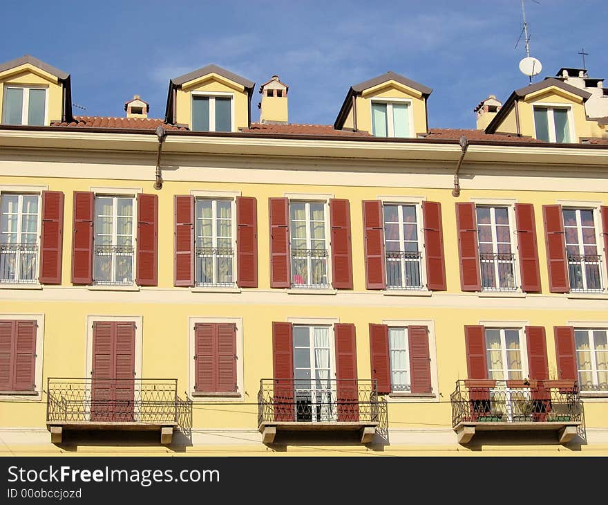 The front of a nice building on the river of the canal naviglio in Milan. The front of a nice building on the river of the canal naviglio in Milan