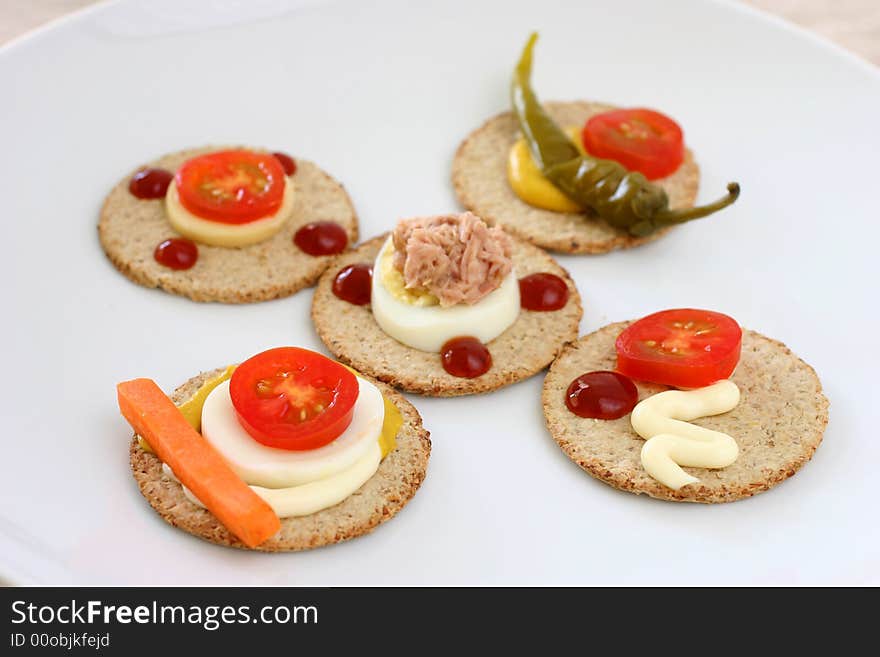 Healthy colorful platter with assorted vegetables on fancy white china. Healthy colorful platter with assorted vegetables on fancy white china