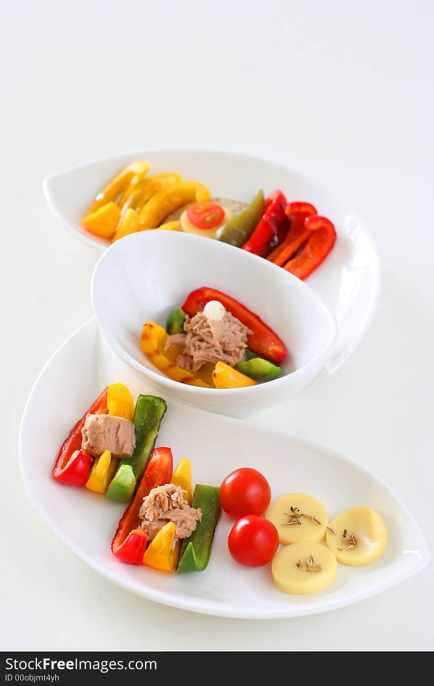 Healthy colorful platter with assorted vegetables on fancy white china. Healthy colorful platter with assorted vegetables on fancy white china