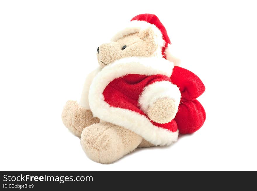 Teddy bear in santa claus dress