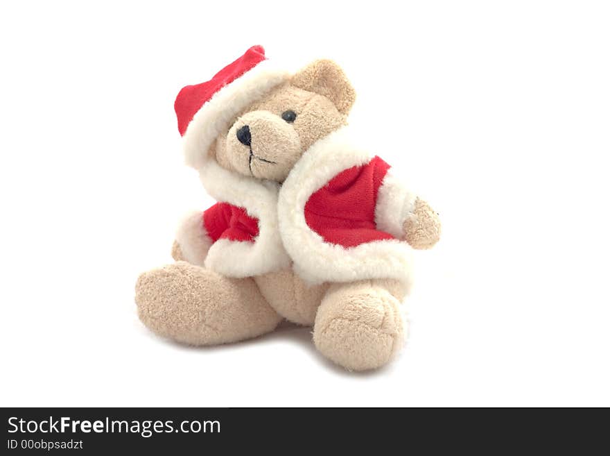 Teddy bear in santa claus dress