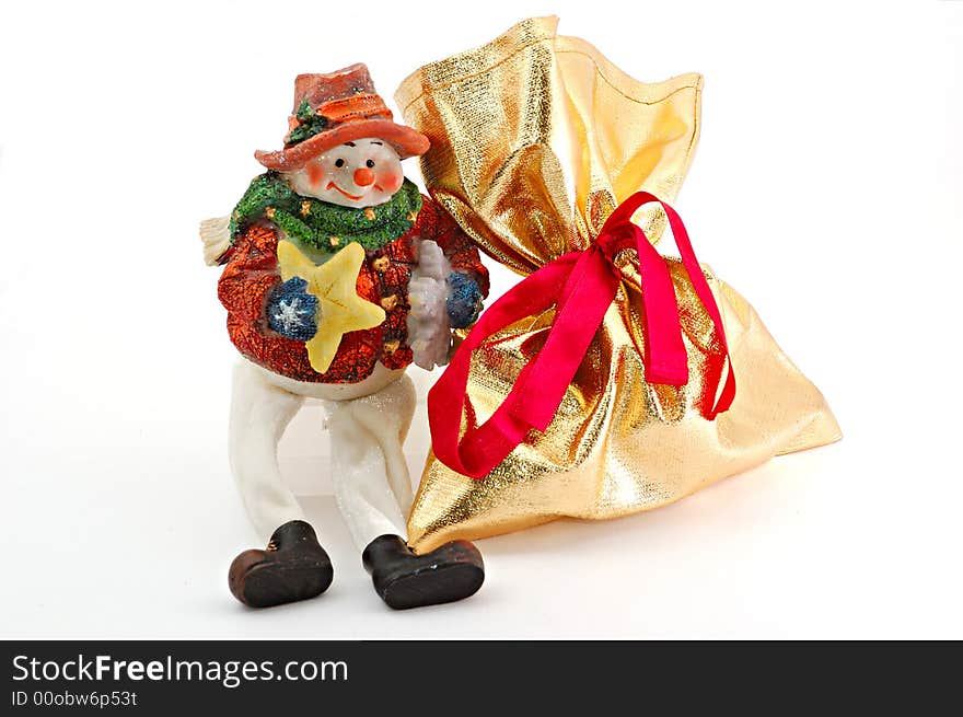 Porcelain figure and gift on white background