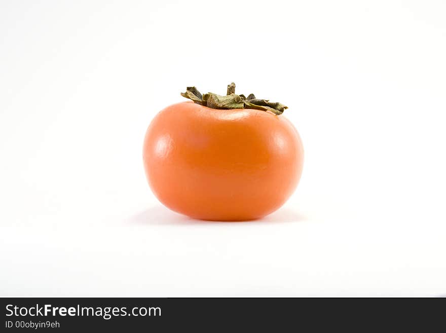 Persimmon on white a background