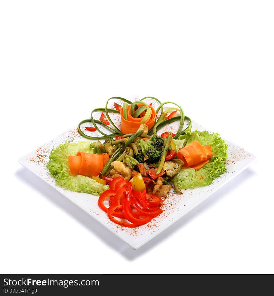 Gourmet vegetable dish on rectangular plate. Gourmet vegetable dish on rectangular plate