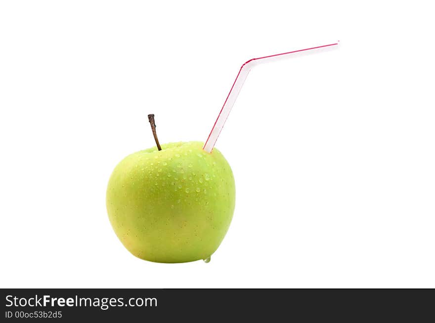 Green apple with drinking straw on white background. Green apple with drinking straw on white background