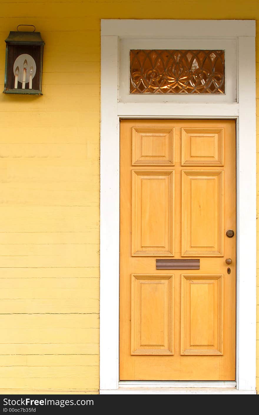 Yellow Door With White Frame