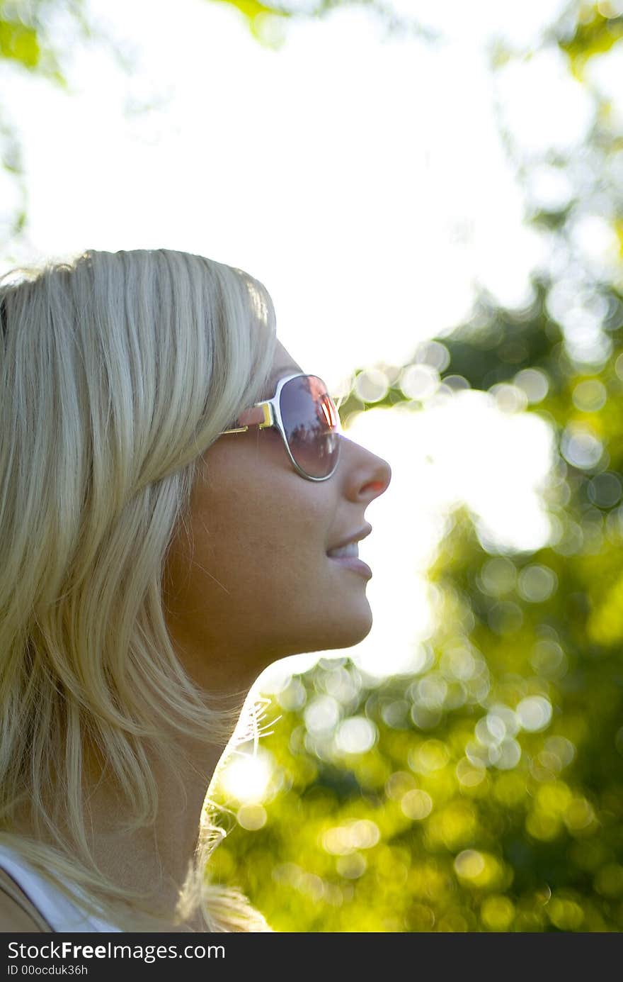 Young Blond Woman With Sunglasses