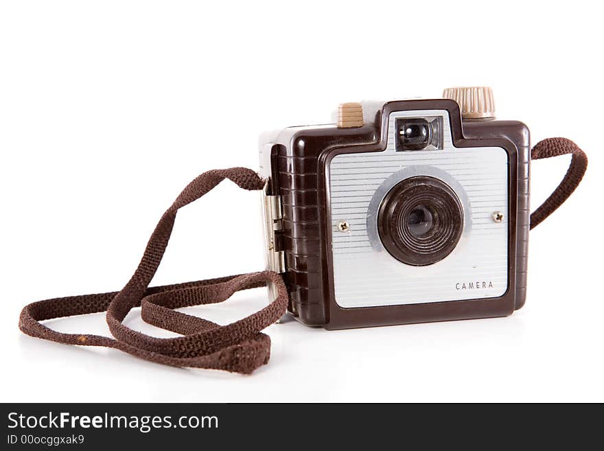 Retro point-and-shoot camera isolated on white.