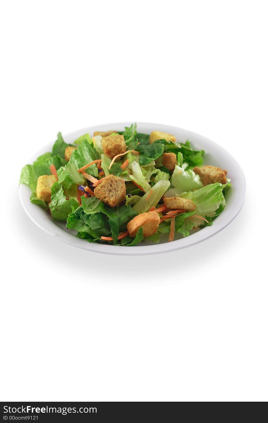 Generic salad on white plate isolated on white background.