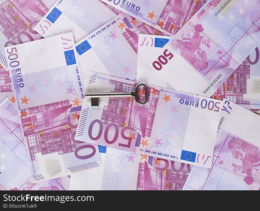 Euro banknotes background and key. Euro banknotes background and key