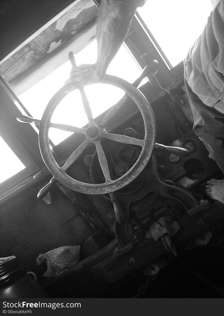 A steering wheel of a bumboat controlled by its captain