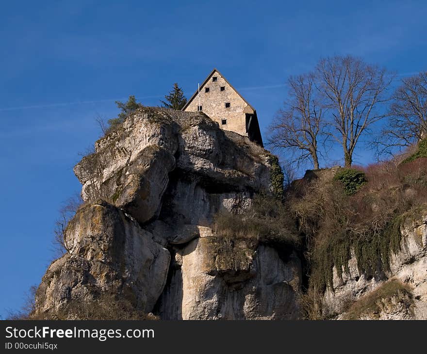 German castle Pottenstein at the edge of a rock. German castle Pottenstein at the edge of a rock