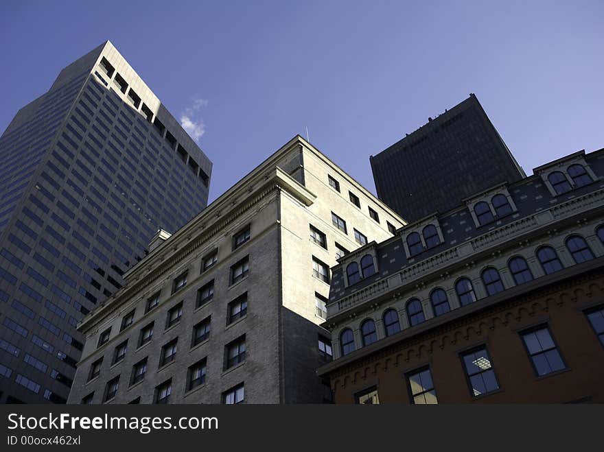 Buildings appear stacked on buildings in Boston, MA. Buildings appear stacked on buildings in Boston, MA