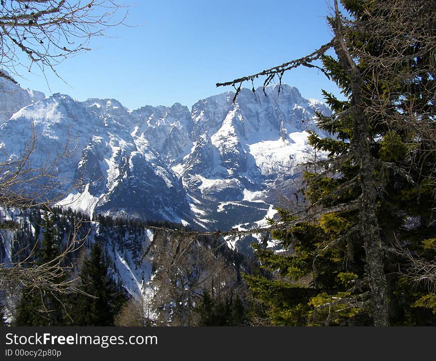 Beautiful winter scenic, high mountain peaks covered in snow. Beautiful winter scenic, high mountain peaks covered in snow