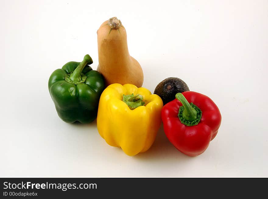 Vegetables on a white background.Vegetables are parts of plants that are consumed by humans or other animals as food. The original meaning is still commonly used and is applied to plants collectively to refer to all edible plant matter, including the flowers, fruits, stems, leaves, roots, and seeds.