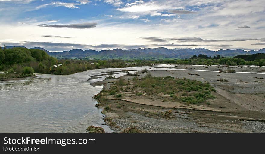 A river meandering down te Southern Alps in New Zealand. A river meandering down te Southern Alps in New Zealand