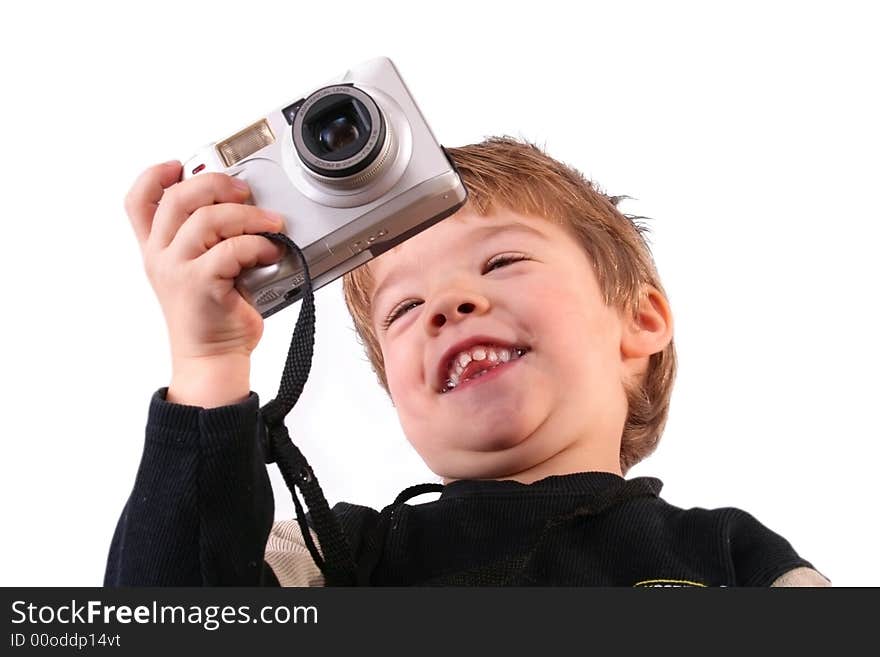 Young boy taking a photograph