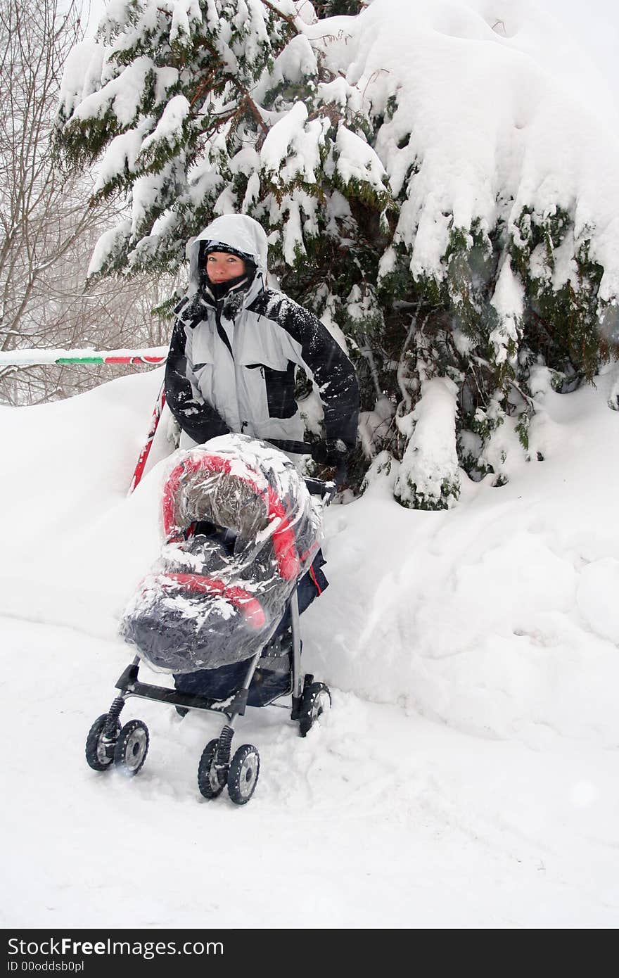 Mother with son in winter time