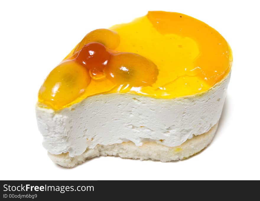 Closeup of single cheesecake isolated on white background.