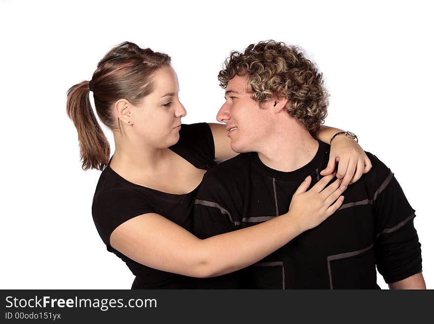 Young couple looking in love facing each other