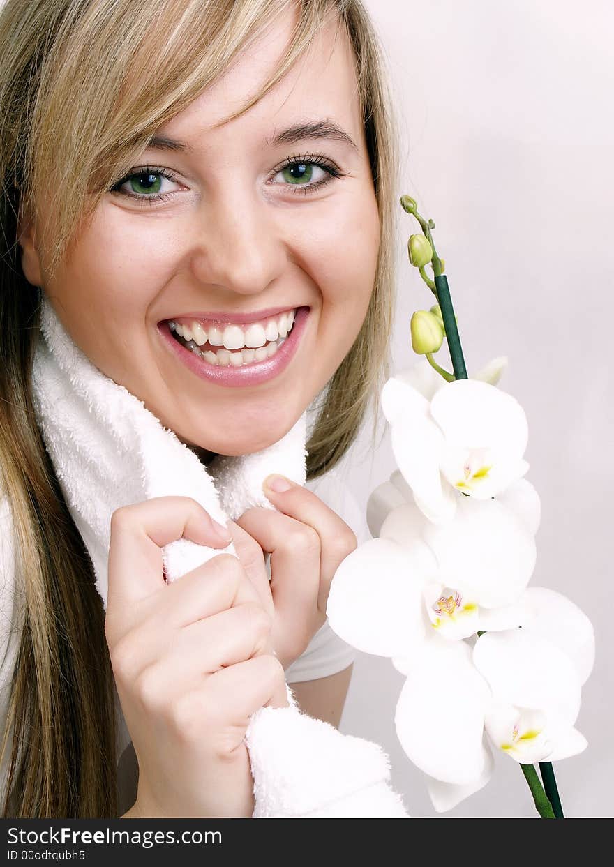 Close up of beautiful woman with white orchid. Close up of beautiful woman with white orchid