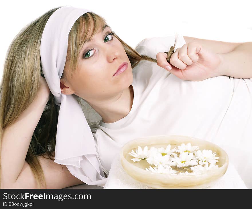 Close up of beautiful face and bowl full of flower. Close up of beautiful face and bowl full of flower