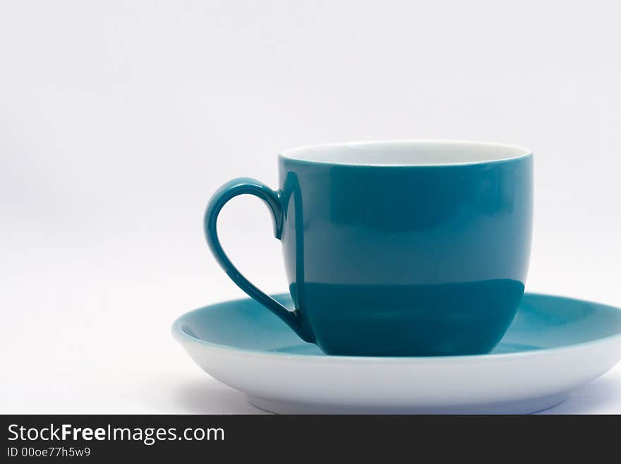 Blue coffee cup with saucer