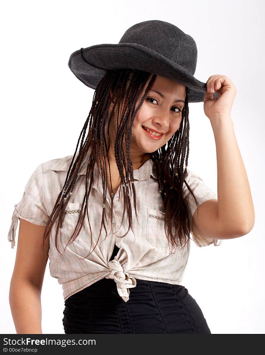 A sexy cowgirl over a white background