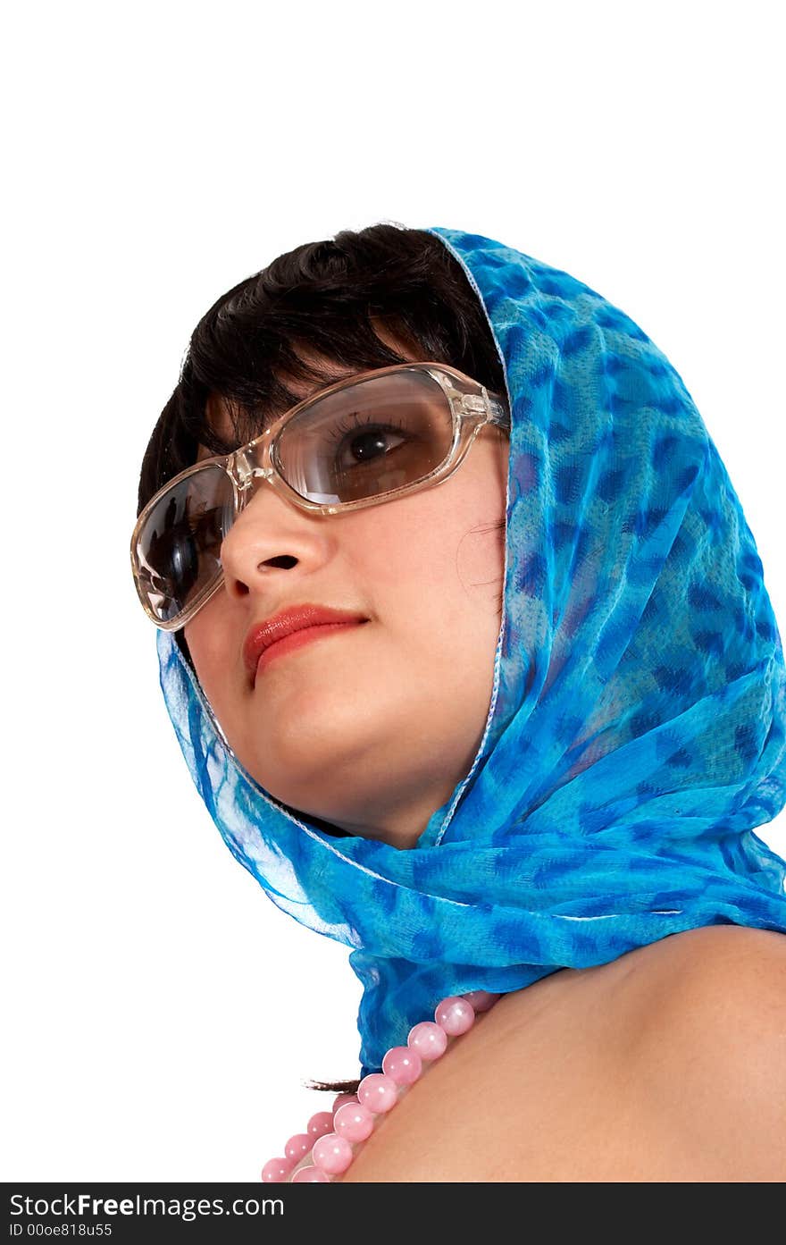 Portrait of a beautiful woman wearing a blue scarf