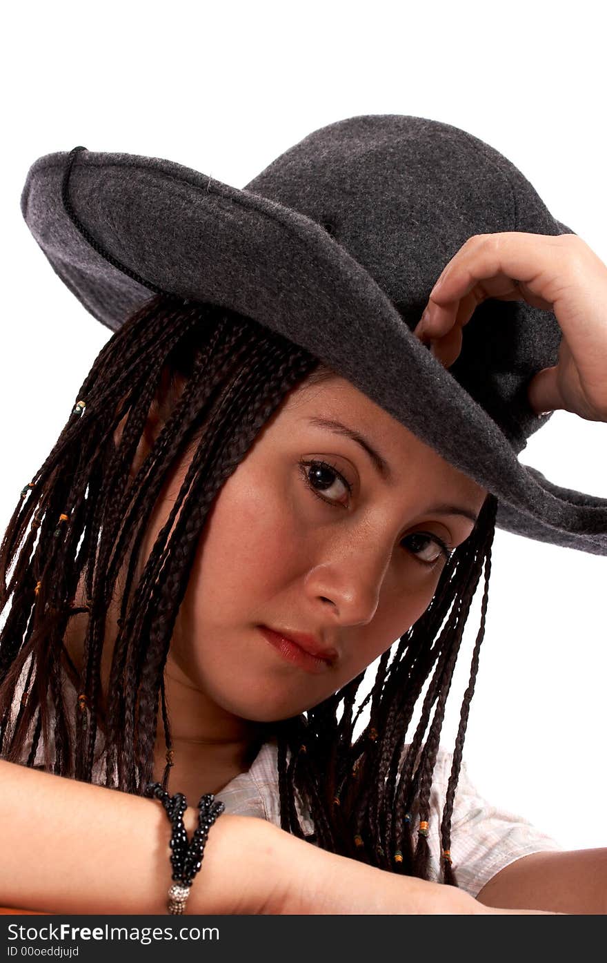 Portrait of a cowgirl over a white background