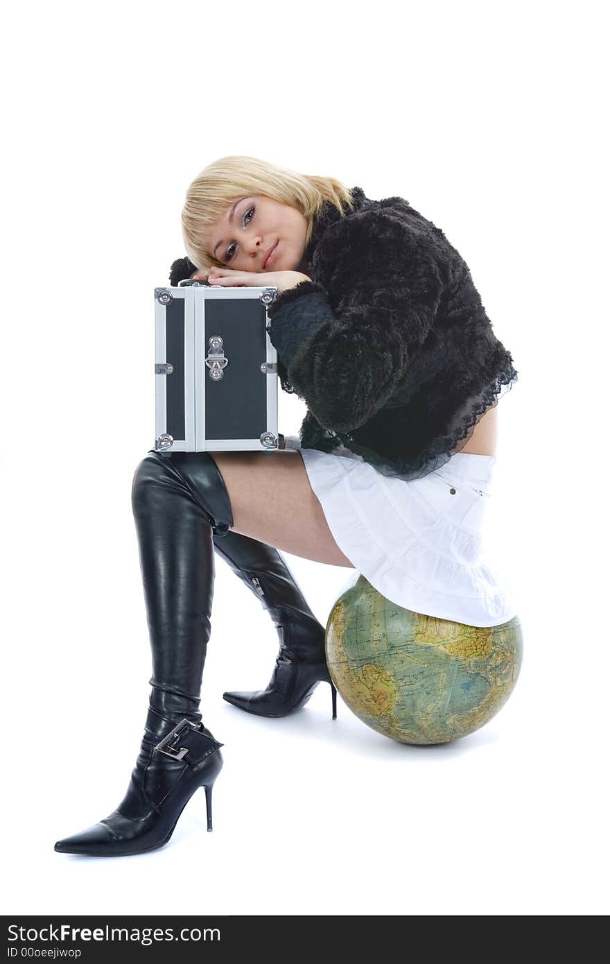 Beautiful blonde with valise and globe