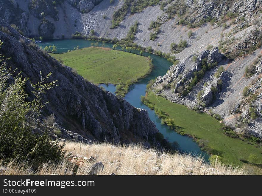 Flowing river in the deep canyon