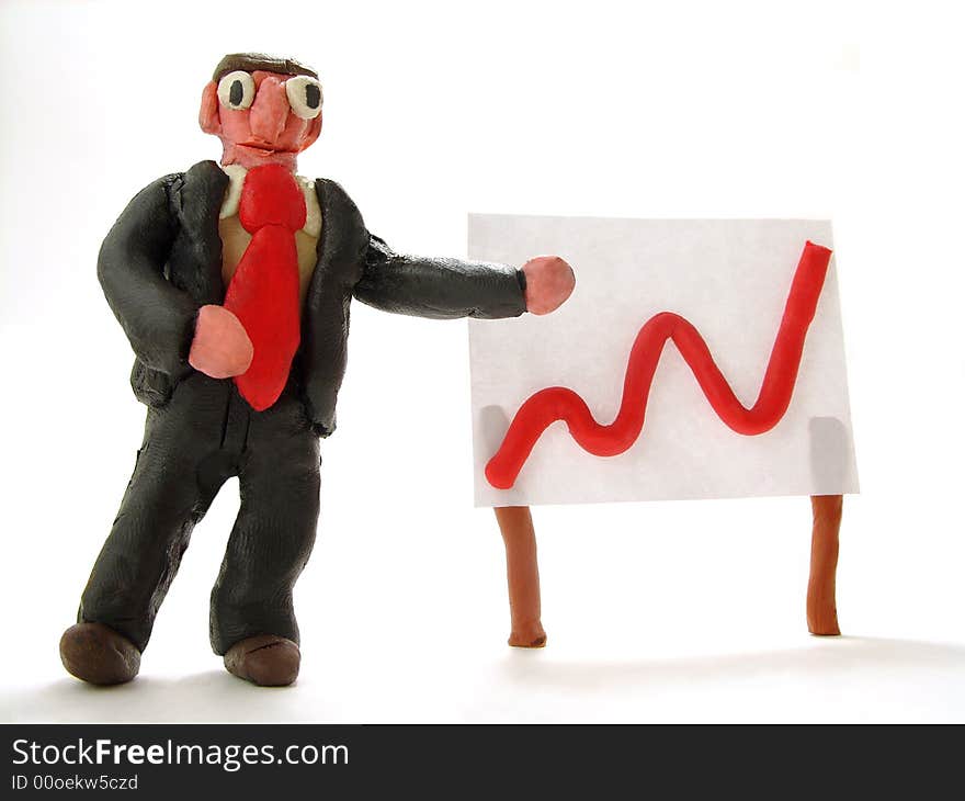 Comical plasticine businessman with an increasing graph. Comical plasticine businessman with an increasing graph