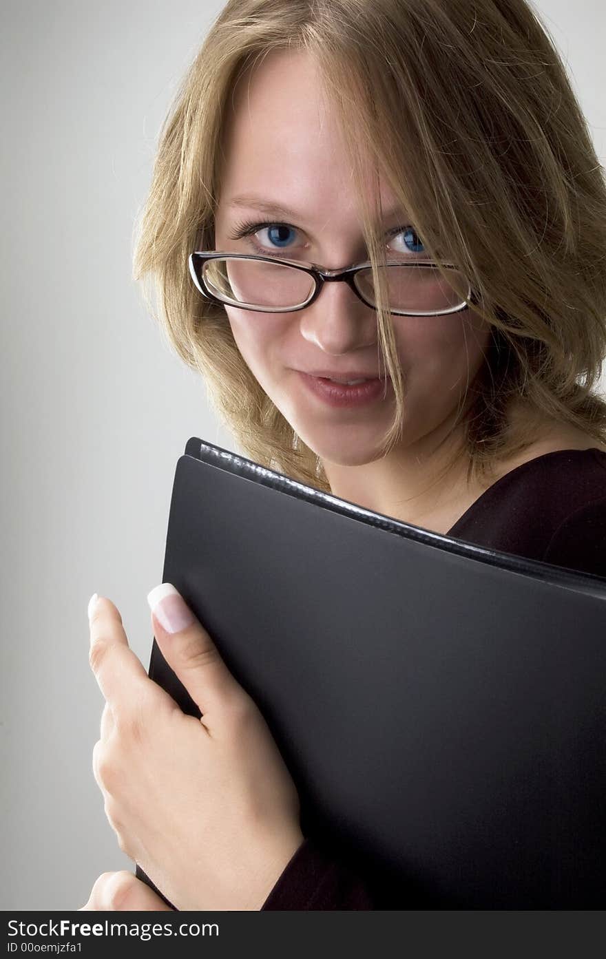 Business woman, portrait on grey