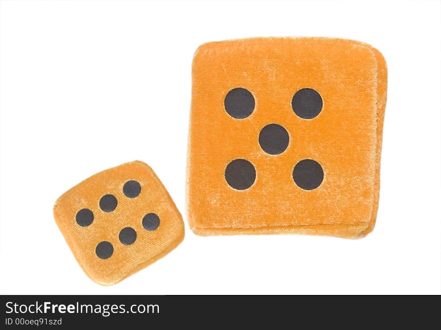 Orange Stuffed toy dice on white background