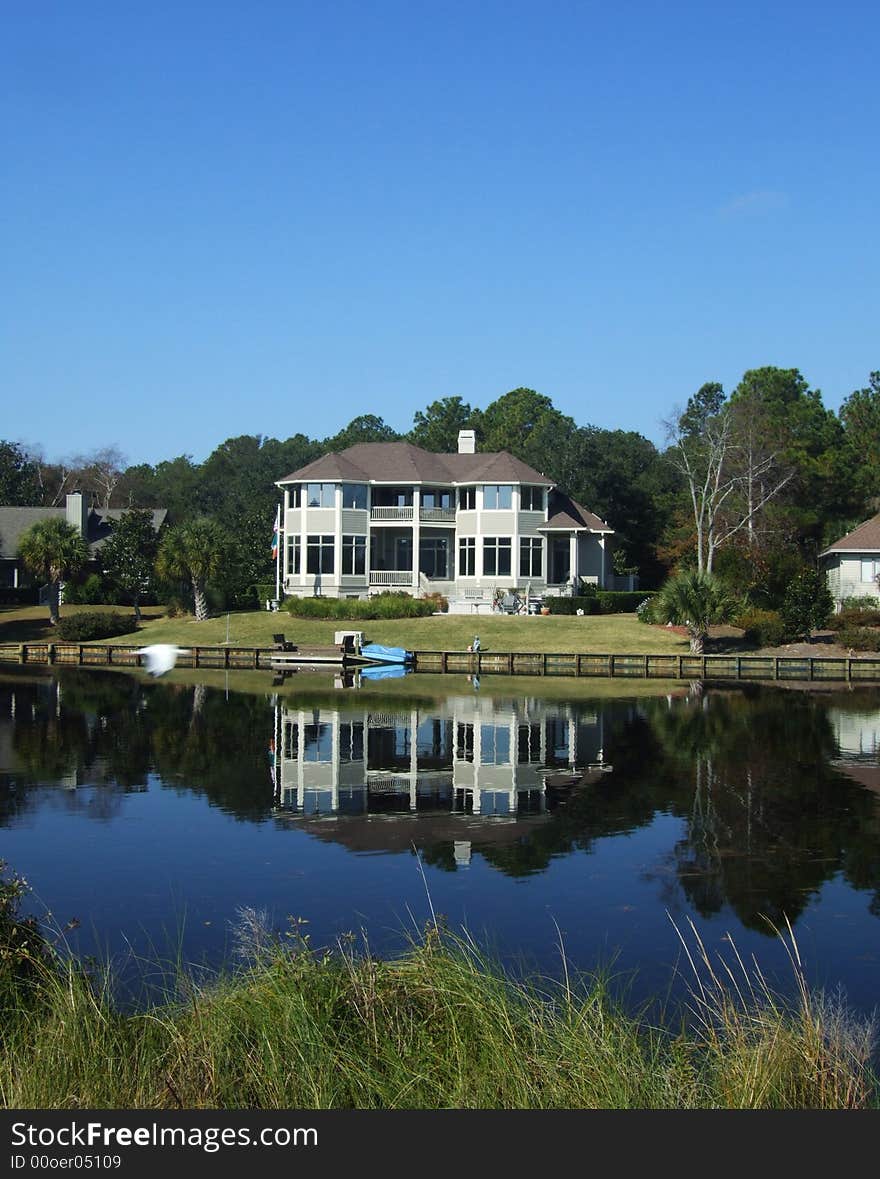 A luxury home on a river. A luxury home on a river