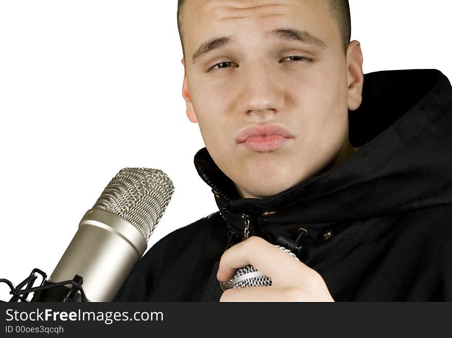 Teenager boy acting like singing and making a face.

Studio shot. Teenager boy acting like singing and making a face.

Studio shot.