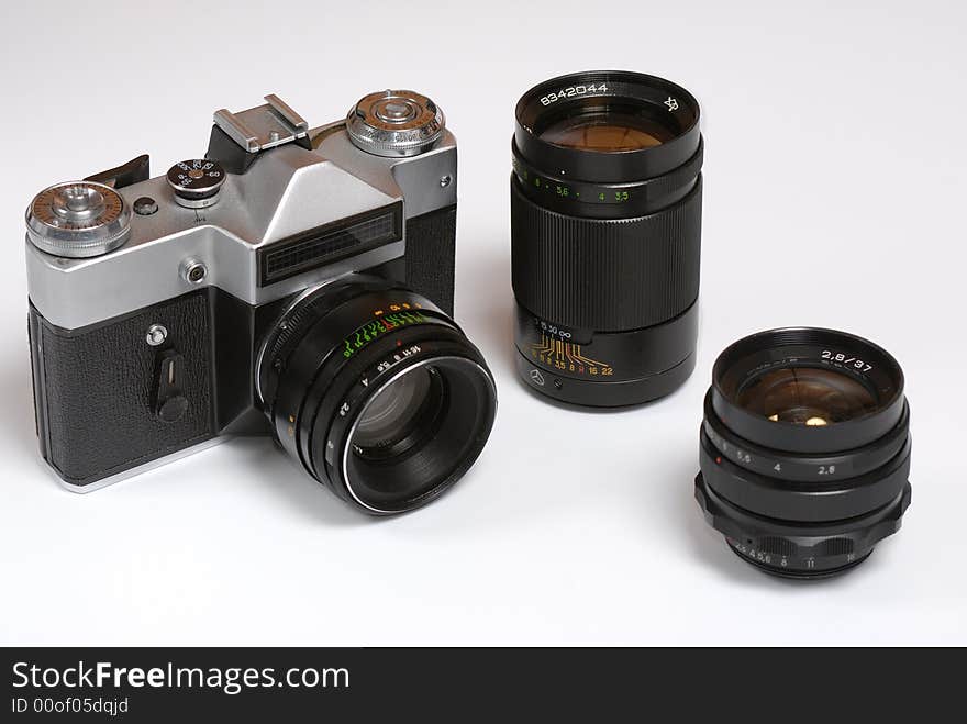 Old soviet 35mm film camera with normal, wide and tele lenses. Old soviet 35mm film camera with normal, wide and tele lenses