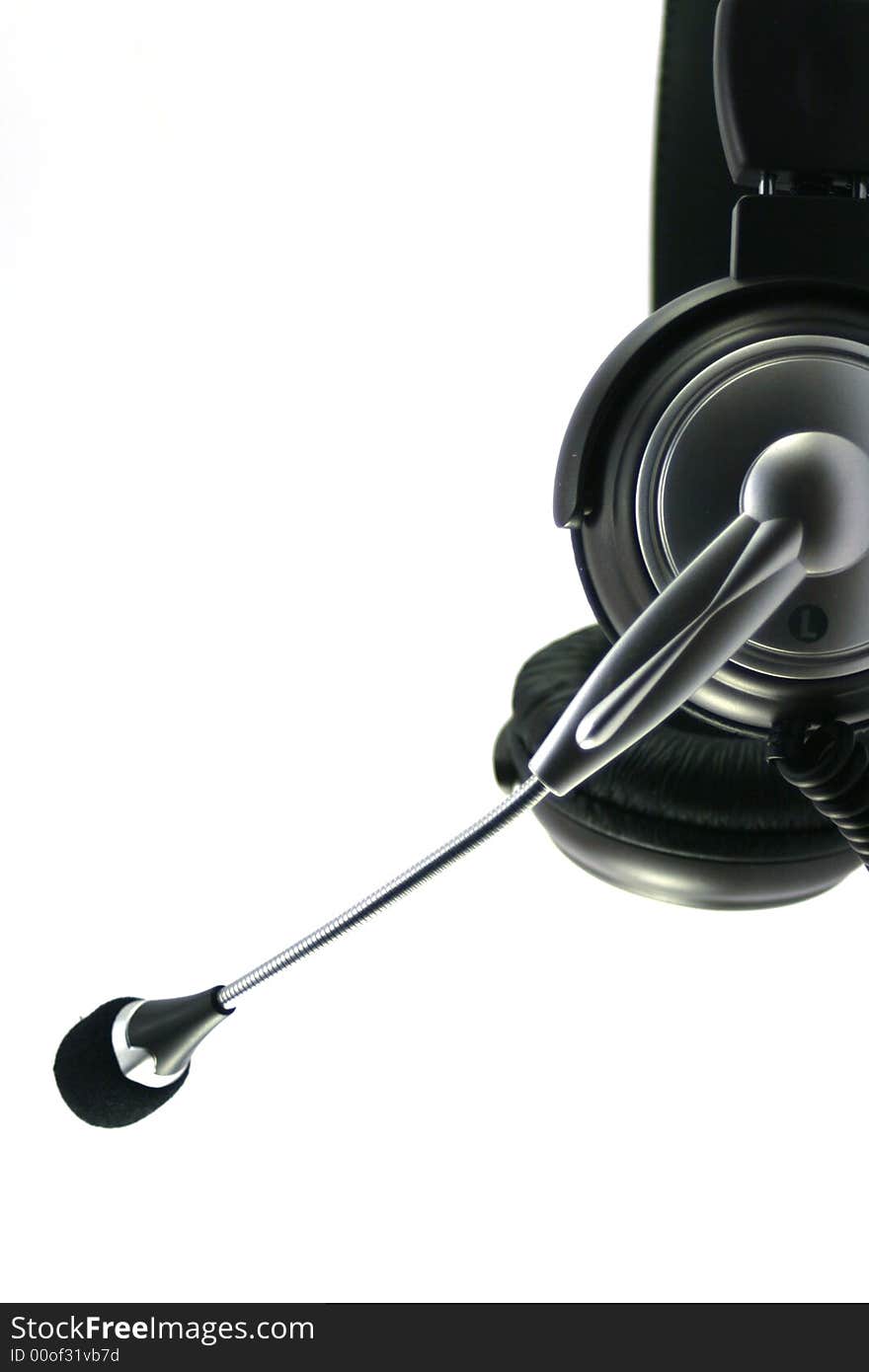 Left angle of headphones with microphone on white background