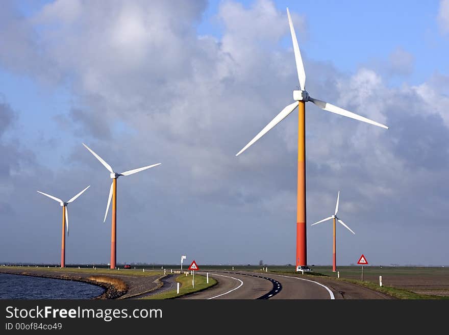 Windturbines at the IJsselmeer in the Netherlands. Windturbines at the IJsselmeer in the Netherlands