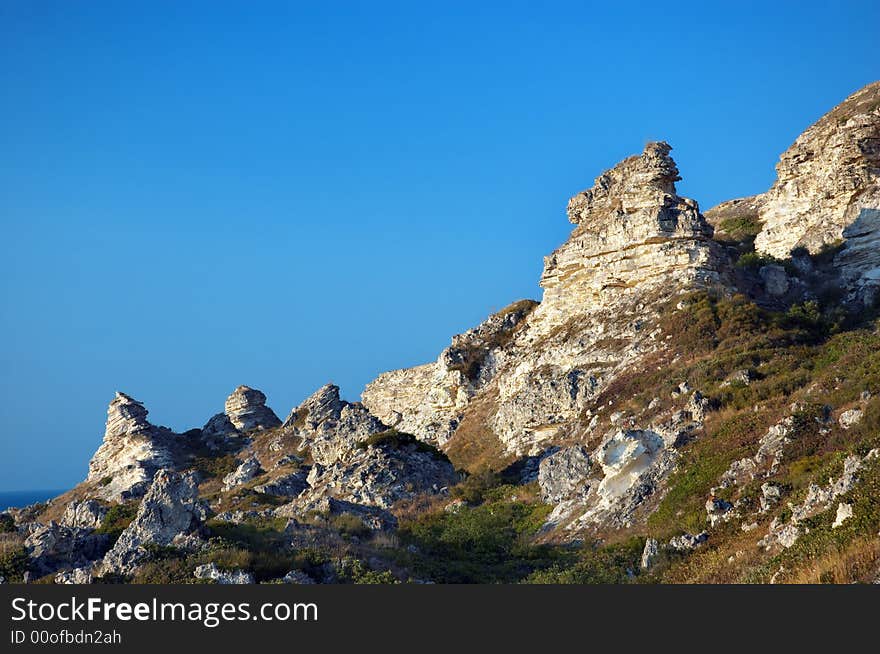 Surreal rock peaks on the sea coast. copy space. Terhankut, Crimea. Surreal rock peaks on the sea coast. copy space. Terhankut, Crimea.