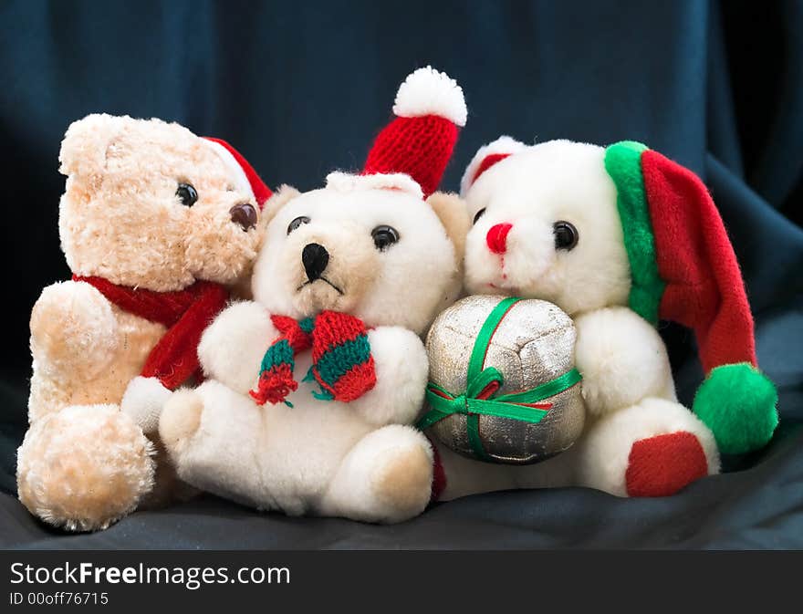 Still life of three bears on black background. Still life of three bears on black background