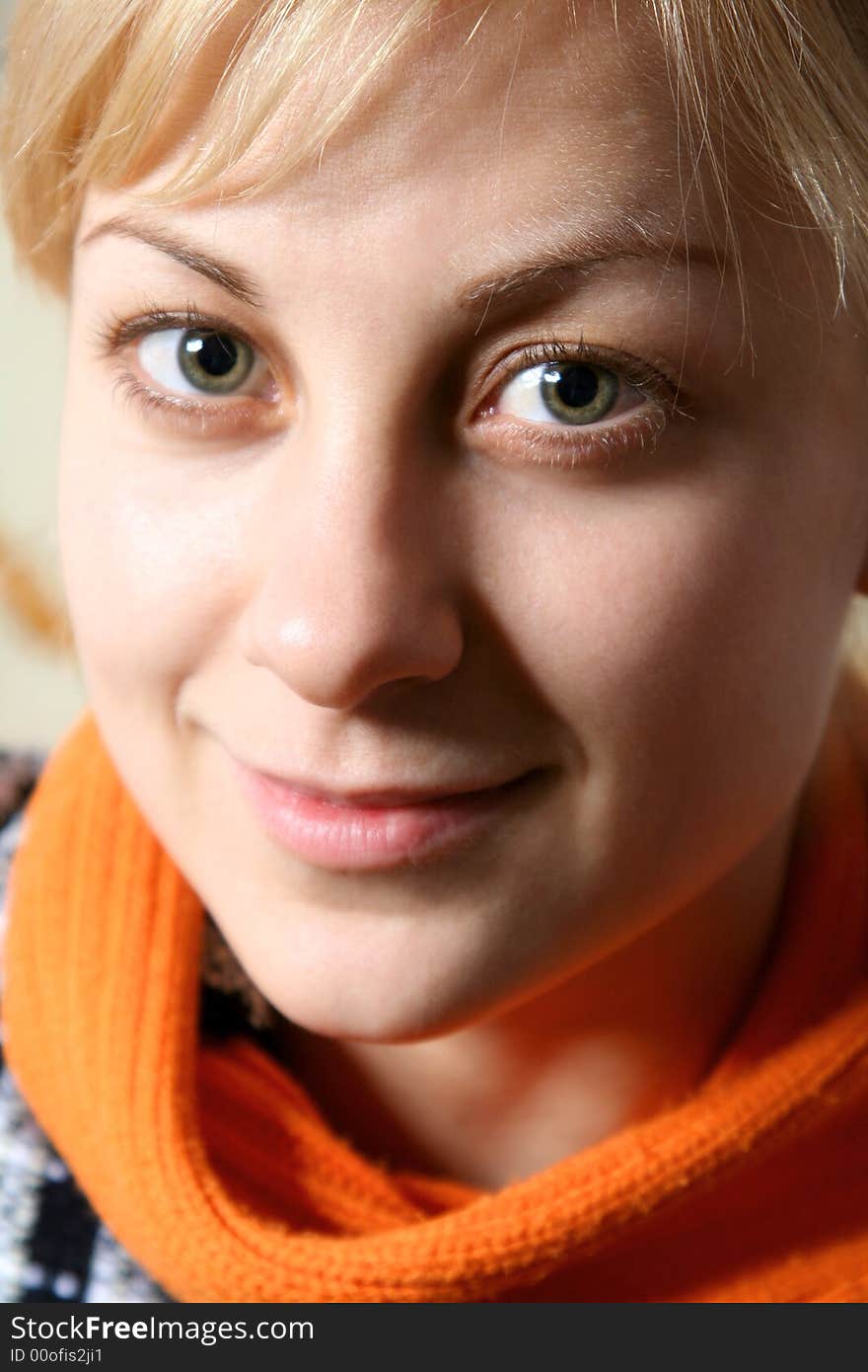 Beautiful girl in orange scarf