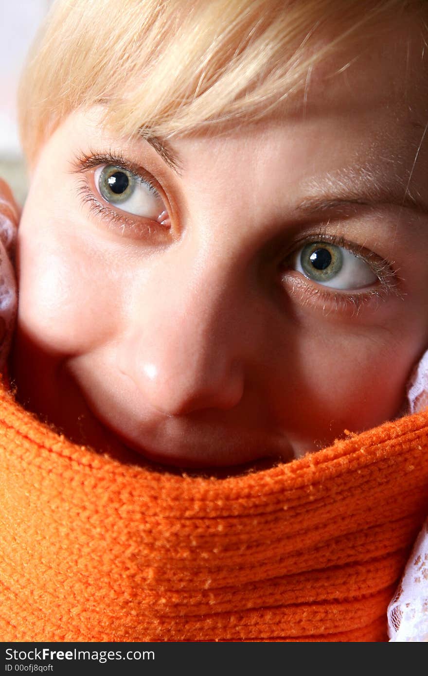 Beautiful girl in orange scarf